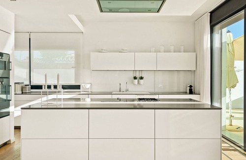Urbanizacion Costabella Villa | Beachfront Villa with Heated Pool & Spa