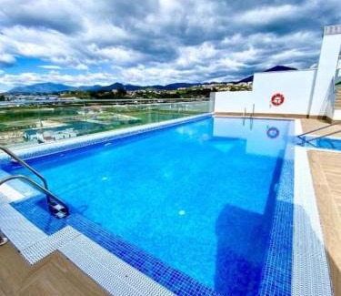 Nueva Andalucia Apartment | Elegant 2 BDRM Minimalist Apt w Pool & BBQ