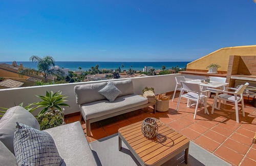 Urbanizacion Costabella Apartment | Modern beachside Penthouse with amazing sea views in Costabella, Marbella