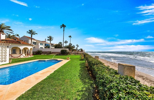 Urbanizacion Marbessa Villa | 1100 Stunning Marbesa Beachfront Villa with Garden Pool