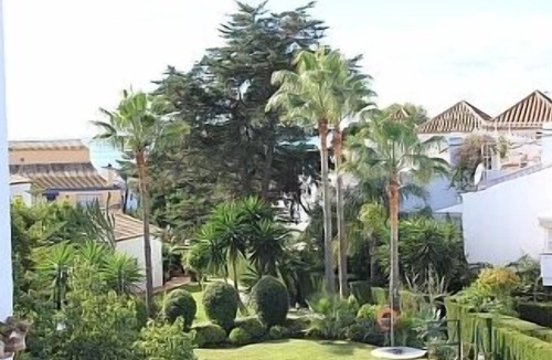 Urbanizacion Costabella Apartment | 2 Bedroom Apartment with sea views. Large Shared Pool, Manicured Gardens