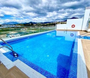 Nueva Andalucia Apartment | Elegant 2 BDRM Minimalist Apt w Pool & BBQ
