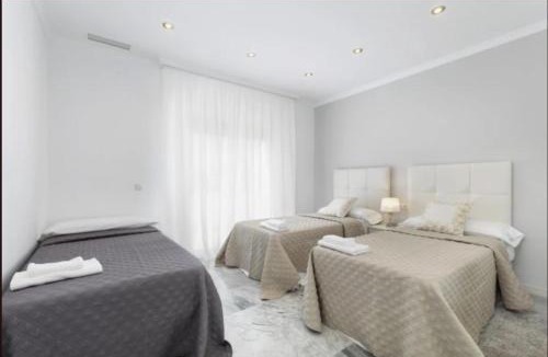 Puerto Banus Villa | Elegant Villa Retreat with Lush Gardens by Lodgerstrip