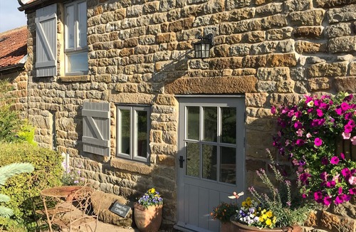 Staintondale Cottage | HONEY BEE COTTAGE, pet friendly, with open fire in Staintondale
