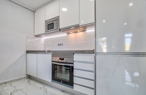 Quesada Apartment | Immaculate modern apartment in the high st of the very popular Ciudad Quesada.