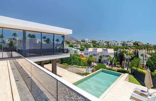 Nueva Andalucia Villa | Luxury 5-bedroom villa in pleasant Marbella with pool, AC, cinema room