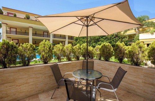 Nikki Beach Apartment | Studio Apartment 'Romana Playa 203' with Pool, Private Terrace & Wi-Fi