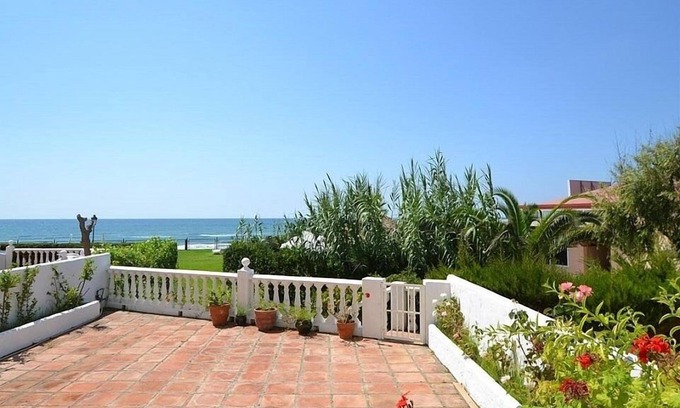 Marbella Apartment | Stunning sea views & large ground floor terrace, 30m from the beach